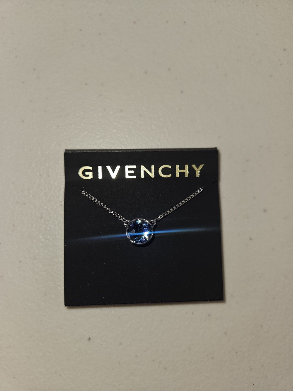NWT Givenchy Silver Tone Necklace with Blue Crystal Charm